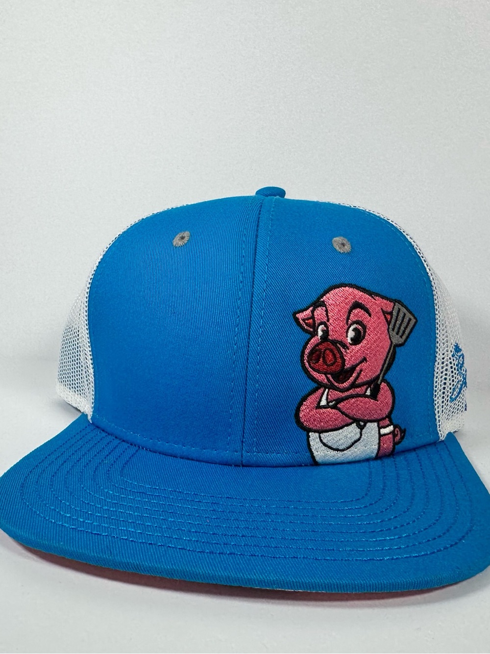 SALT LICK Blue Trucker Hat with Pink Pig Patch
